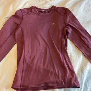 Purple long-sleeved base layer workout shirt